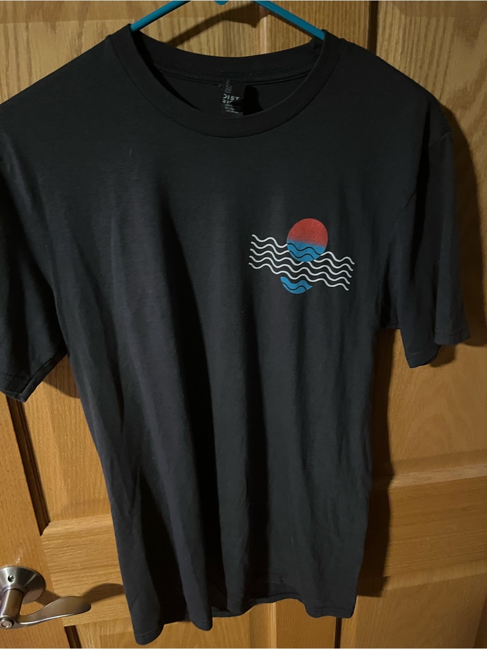 District Black Short-Sleeve Tee with Red and Blue Wave Graphic